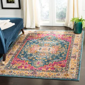 A 5' x 7.5' Safavieh rug with a vibrant design featuring a blue base accented by pink, orange, and yellow patterns. It rests on dark wooden flooring next to a blue chair and potted plant.